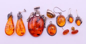 A large dress pendant and four pairs of dress earrings and a single earring. Pendant 6 cm high.