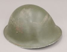 A British WWII tin helmet with liner. 27.5 cm wide.