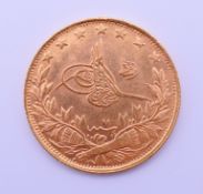 A 22 ct gold Turkish 100 kurush coin. 7.2 grammes.