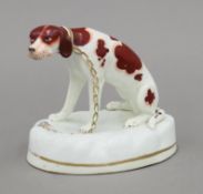 A 19th century Staffordshire pottery dismal hound. 10.5 cm high.