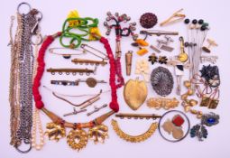 A quantity of various jewellery to include brooches, bar brooches, earrings, cufflinks, chains,