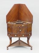 A 19th century mahogany corner washstand. 79 cm wide.
