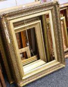 A quantity of vacant picture frames. The largest 57 x 82 cm.