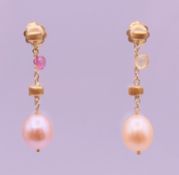 A pair of Marco Bicego 18 ct gold and pearl drop earrings. 3.5 cm high. 4.6 grammes total weight.