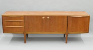 A McIntosh mid-century teak dining suite, comprising an extending dining table,