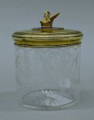 A Russian enamel-decorated silver gilt-mounted etched glass jar. 13 cm high.