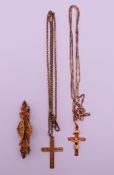 A 15 ct gold brooch 2.9 grammes total weight, a 9 ct gold crucifix pendant on a 9 ct gold chain 2.