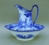 A Victorian Doulton blue and white porcelain jug and bowl. The jug 35 cm high.