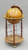 A globe-form drinks cabinet. 90 cm high.
