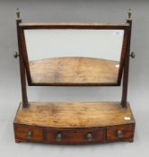A 19th century mahogany toilet mirror. 56 cm wide.