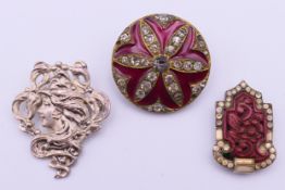 An Art Deco German DRGM silver and possibly cinnabar dress clip,