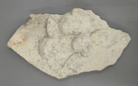 A stonework carving of angels. 42 cm high.