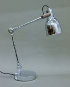 A chrome desk lamp. 45 cm high.