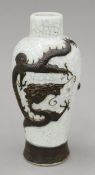 A late 19th/early 20th century Chinese crackle glaze pottery vase.