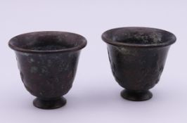 A pair of small Chinese bronze cups. Each 4.5 cm high.