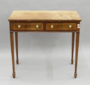 A mahogany two-drawer dressing table and a reproduction small sofa table. The former 91.5 cm wide.