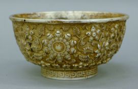 A Chinese white metal bowl. 12 cm diameter.