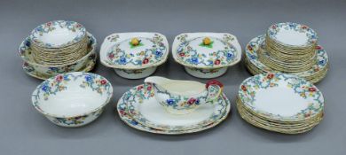 A Royal Cauldon Victoria pattern dinner service. The tureen 22 cm wide.