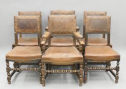 A set of six early 20th century oak dining chairs. The carvers each 61 cm wide.