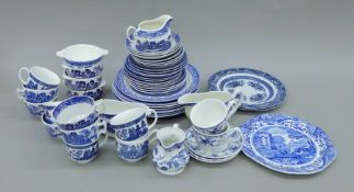 Two boxes of blue and white porcelain tea and dinnerwares. The gravy boats each 20 cm long.