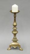 A 17th century Italian bronze pricket candlestick, engraved 'Sebo Ant Liuirani.F.F. A.D.