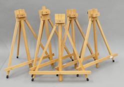 Five small Winsor & Newton artist's easels. Each approximately 47 cm high closed.