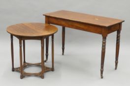 A Victorian mahogany centre table and a Victorian mahogany side table. The former 68 cm diameter.