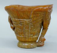 A Chinese libation cup. 12 cm high.