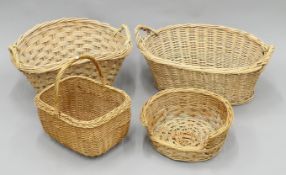 A quantity of various vintage baskets. The cat basket 39 cm wide.