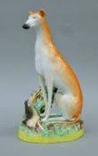 A circa 1850 large Thomas Parr Staffordshire porcelain greyhound. 29.5 cm high.