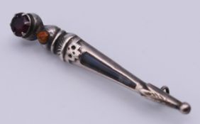 A Scottish silver and hardstone dirk form brooch. 5.8 cm high.