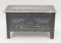 A Victorian carved oak trunk. 91 cm wide.