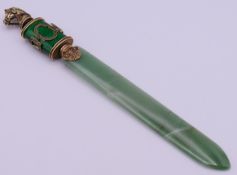A silver-gilt and jade horse head letter opener. 25.5 cm long.