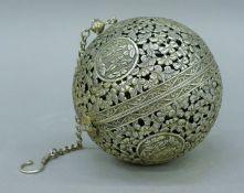 A Chinese white metal travelling censer. 10 cm high.