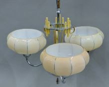 An Art Deco three-branch hanging light. 45 cm high.