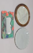 Three wall mirrors, one decorated with a crane. The latter 50.5 cm high.