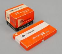 A boxed View-Master 3-Dimension viewer model E and a boxed View-Master album. The former 13 cm wide.