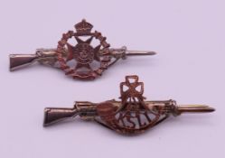 Two silver regimental sweetheart brooches,