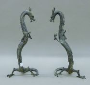 A pair of Chinese bronze dragons. Each 41 cm high.