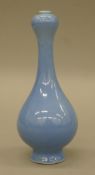 A small blue ground Chinese porcelain vase. 17 cm high.