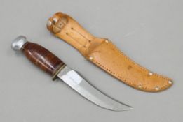 A vintage sheath knife. 23 cm long overall.