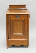A Victorian walnut coal scuttle with shovel. 38 cm wide.