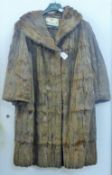 A ladies' fur coat. Length 93 cm.