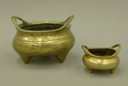 Two Chinese bronze censers. The larger 15 cm wide.