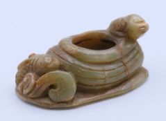A jade fish and bird brush washer. 8 cm long.