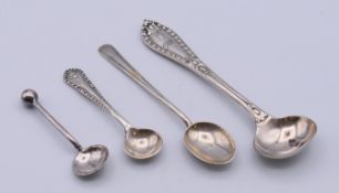 Two silver spoons and two silver-plated spoons. Largest 11 cm high. 14.2 grammes of silver.
