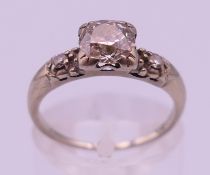 A 14 ct white gold white gold diamond ring. Ring size K. 2.2 grammes total weight.