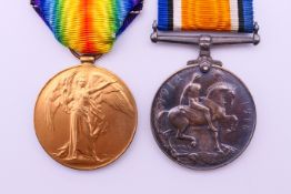 A WWI 1914-1918 British War and a World War I 1914-1919 Victory Medal, both with ribbons,