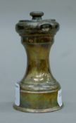 A silver pepper grinder. 9 cm high. 134.4 grammes total weight.