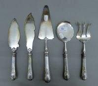 A Continental 800 silver-handled patisserie set. The fork 25.5 cm long.